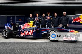 Available for download & editorial use Jerez Spain 9th February 2009 Rob Marshall Sebastian Vettel Red Bull Racing Rb5 Renault Adrian Newey Chief Technical Officer Mark Webber Red Bull Racing Rb5 Renault And Christian Horner Team Principal Red