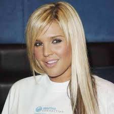 Danielle Lloyd and Teri Marquez (L) pose for photographers to promote the  "Safety Nets" Ball in London