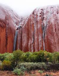Uluru (ayers rock), northern territory, australia. Uluru Waterfalls Ayers Rock Australia Water Cascades Down The Sides After Heavy Rain Ayers Rock Australia Waterfall Wonders Of The World