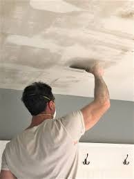 How To Remove Popcorn Ceilings Like A Pro Smoothing Textured Ceilings In 2020 Removing Popcorn Ceiling Ceiling Texture Popcorn Ceiling