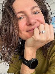 Olympic swimmer Cate Campbell announces surprise engagement to partner Adam  Kerr and shows off her massive diamond ring