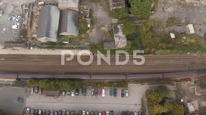 Bird S Eye Aerial Drone Shot Of Train Arriving At Train Station Stock Footage Ad Drone Shot Aerial Bird Aerial Drone Aerial Birds Eye