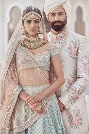  wedding mint coral champagne gold pearl photo invitation. Photo Of Sabyasachi Mint Blue And Rose Gold Bridal Lehenga And Sherwani