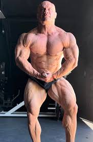 Mike israetel, 1 week out from masters nationals. 225, 56. Obviously  morbidly obese, according to some on this sub. : rbodybuilding