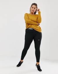 Black And Gold Nike Leggings Plus Size Nike Plus Pro Training Leggings In Black Re Invent My Style In 2019 Plus Size Womens Clothing Plus Size Outfits Asos