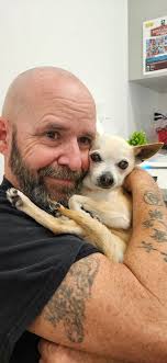 This is Gidget. She is waiting to go for a walk. She is Chihuahua/Pappillon  and is 12 years old. My baby girl.