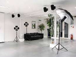 Studio Space With Lighting And Black Seating Studio Interior Studio Photography Photo Studio Design