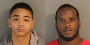2 arrested for firing shots at community center