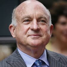 Late Scholastic Chief's Sons Challenge Rival for Control