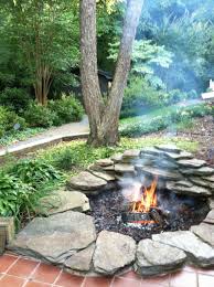I tried just using a shovel for this part, but found that clawing with my hoe and then hoisting out the loose dirt assured that my sandstone rocks were fire pit safe, i started gathering. Diy Fire Pit Ideas That Change The Landscape