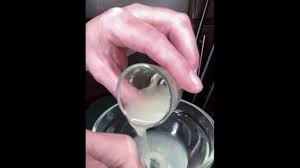 My collected cum from the last couple weeks, thawed and played with and  slurped down with a straw