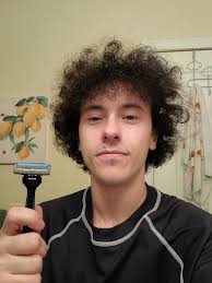 When did wrestling rules change to allow facial hair?