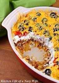 Mexican Casserole Refried Beans Tortilla Chips Ground Beef Salsa Sour Cream Tomatoes Cheddar Chees Recipes Mexican Food Recipes Easy Casserole Recipes