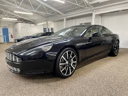 Image result for Onyx Black 2014 Aston Martin