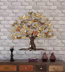 Apart from this, pepperfry offers other home décor items, including table décor, and products for home garden. Buy Iron Butterfly Tree In Golden Wall Art By The Shining Rays Online Floral Metal Art Metal Wall Art Home Decor Pepperfry Product