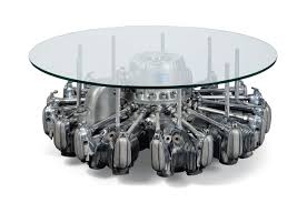 I ve seen coffee tables made from just about everything you can imagine. A Novelty Steel And Glass Coffee Table Adapted From An Aircraft Engine