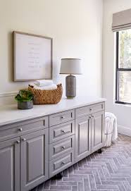 Transitional Laundry With Herringbone Brick Paver Floor Benjamin Moore River Reflections Cabinets And Patter Creative Interior Design Interior Home Remodeling