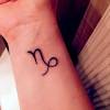 Customize your small leo symbol tattoo a bit by adding a bit of color. 1