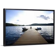 It's in all living things, whether they live at the bottom a whopping 96.5 percent of water on earth is in our oceans, covering 71 percent of the surface of our planet. Person Sitting On Dock With Two Boats In Water Black Float Frame Canvas Art Overstock 25511712
