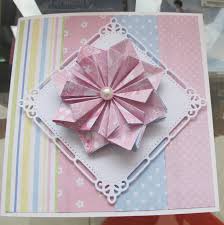 And also as your confidence grows you will want to do something a little more with the card stock that you have. Paper Folding Card Novocom Top
