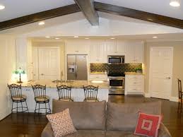 Fireplace, kitchen island, chandelier, hanging pot rack, cathedral. Galley Kitchen Living Room Ideas Ecsac