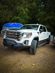 Image result for brown truck vs white truck