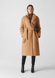 And we're not alone in championing the iconic coat. Camel Wool Textured Belted Coat Whistles Whistles