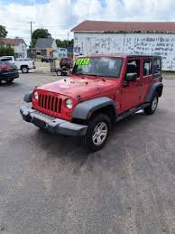 Image result for Flame Red 2009 Jeep