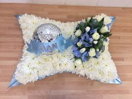 Flowers for funeral can be arranged by numerous floral designers, although some business do specialize in providing blue funeral flower arrangement online so you could wish to check online. White Based Cushion Funeral Tribute With Baby Blue Ribbon Edge White Rose And Delphini Funeral Flower Arrangements Funeral Flowers Wedding Flower Arrangements