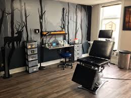 Tell us your tattoo idea or design. High End Tattoo Shop Interior Design Tattoo Design