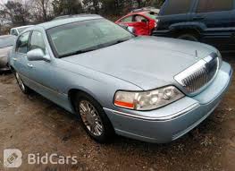Image result for Light Ice Blue 2010 Town Car