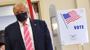 Trump Votes In Person And Slams Mail In Voting As Campaign Urges Voters To Vote By Mail