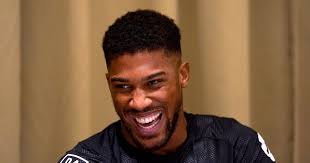 Relaxed Anthony Joshua eyes early stoppage in bid to reclaim world titles