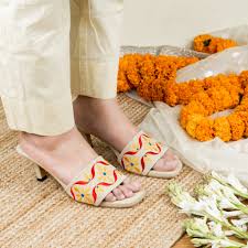 Step into a world of vibrant elegance with Margot Molly! These  hand-embroidered beauties are perfect for adding a touch of festivity to  your look. Whether it's a casual gathering or a festive