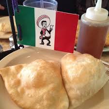 Pour and evenly spread the sour cream sauce over the enchiladas and sprinkle with the cheese. Alexandra Clark Mexican Buffet Panchos Recipe Buffet Food