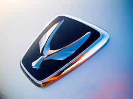 Way back in 1913 (when the company was founded), the emblem featured a and m inside a circle. Behind The Badge The Forgotten Hyundai Equus Logo Its Deceptive Design The News Wheel
