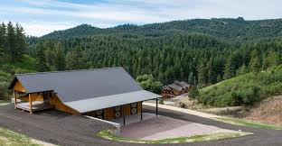 Access to the upstairs is via the rear since it's buil. New Custom Yak Goat Barn Project On Rocky Mountain Hillside In Sedalia