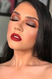 Complete the makeup by applying a pink blush on the cheeks. Brown Glitter Smokey With Red Lipstick Makeup Idea Redlipstick When You Wan Prom Makeup For Brown Eyes Red Dress Makeup Homecoming Makeup
