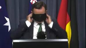 #clive palmer #mark mcgowan #auspol #western australia #vexatious the wa liberal opposition is trying to attack mark mcgowan on his economic performance by going he. Video Wa Premier Mark Mcgowan Pulls His Face Mask Over His Eyes Daily Mail Online
