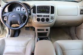 Image result for Gold Ash 2004 Escape