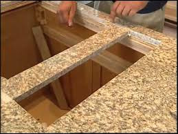 If you were wondering how to install a corian or solid surface decorative supports are provided or fabricated by the cabinet/countertop company. Installing A Granite Countertop And Kitchen Cabinets Youtube