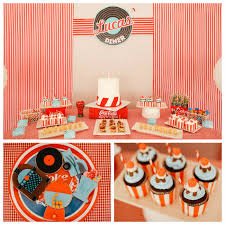 Jump suits and hanging handcuffs are great outfit pieces for this party theme. Kara S Party Ideas 50 S Diner Inspired Birthday Party