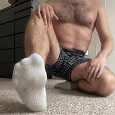 Uncensored action with men in socks - quench your thirst for raw passion and intense arousal