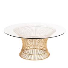 A glass coffee table makes for an elegant, subtle addition to the room, while a coffee table with storage is perfect for creating space for a striking centerpiece. Warren Platner Wire Table Coffee Table