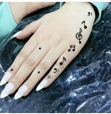 Musical Notes Tattoo Henna Patterns In 2020 Henna Tattoo Designs Henna Tattoo Designs Simple Henna Tattoo Designs Hand