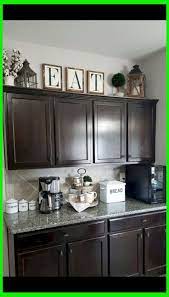 Need Some Ideas For Your Kitchen Decor Kitchen Decor Tips Kitchen Cabinets Decor Decorating Above Kitchen Cabinets Above Kitchen Cabinets
