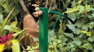 Moves hose bibs from behind plants and shrubs and places faucet in a more convenient, easy to reach location. Garden Hose Extension Device Makes It Easy To Get To A Faucet Behind Shrubs Daily Press