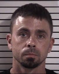 Statesville couple accused of wrongfully taking over $24,000 in aid