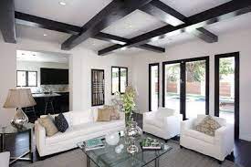 Much like the kitchen, your living room is a central place in your home. See This House A Design Dream Team Creates A Modern Spanish Style Dream Home Cococozy Black And White Living Room Beams Living Room Living Room White