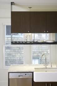 Cabinet And Open Shelving Above A Kitchen Island Vaughan Residence Contemporary Kitch Hanging Shelf Kitchen Kitchen Inspiration Design Kitchen Wall Storage
